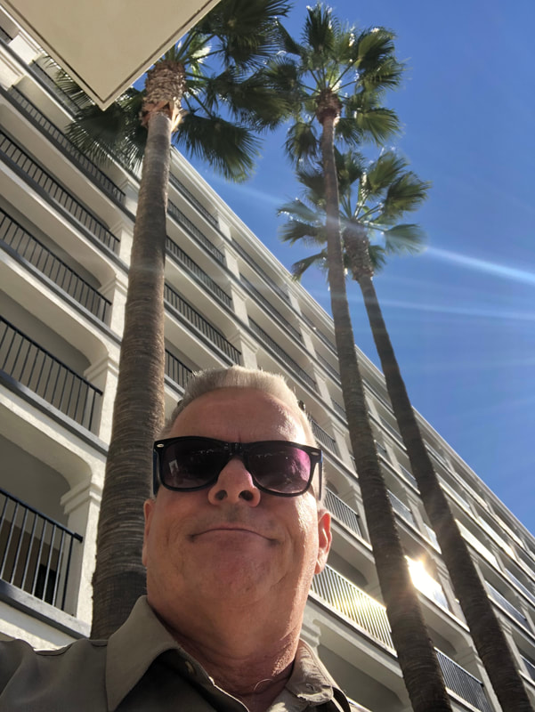 Dave under the palms in Anaheim