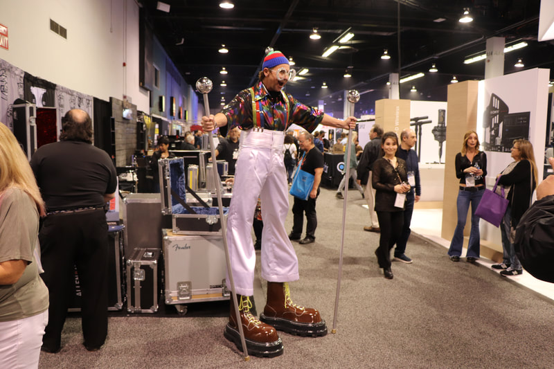 Stilt walker on the NAMM show floor